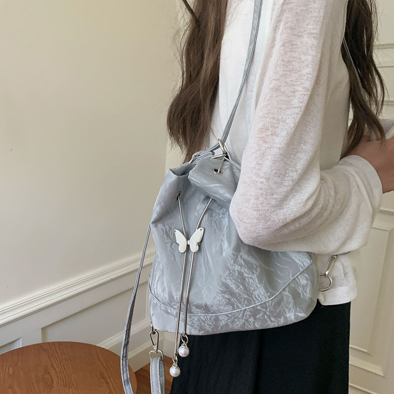 Mochila con cordón y mariposa  - Leather Work Backpack reseña y precio