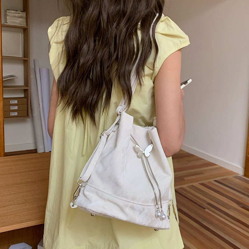 Mochila con cordón y mariposa  - Leather Work Backpack reseña y precio